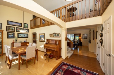 Set on a beautifully landscaped half-acre lot, this spacious on Urbandale Golf and Country Club in Iowa - for sale on GolfHomes.com, golf home, golf lot