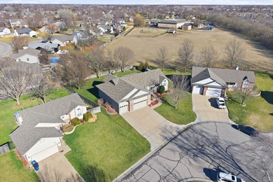 This beautifully designed 5-bedroom, 3-bath ranch with a 4-car on Auburn Hills Golf Course in Kansas - for sale on GolfHomes.com, golf home, golf lot