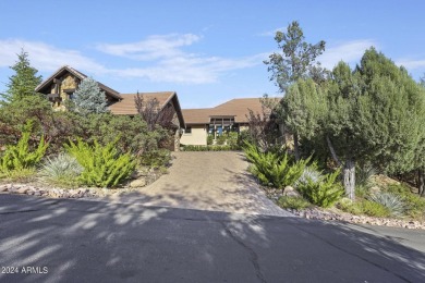 Nestled in the prestigious Rim Golf Club, this stunning custom on The Rim Golf Club in Arizona - for sale on GolfHomes.com, golf home, golf lot