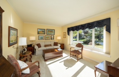 Set on a beautifully landscaped half-acre lot, this spacious on Urbandale Golf and Country Club in Iowa - for sale on GolfHomes.com, golf home, golf lot