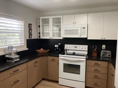 Immaculate and fully renovated 1-bedroom, 1.5-bath condo in the on  in Florida - for sale on GolfHomes.com, golf home, golf lot