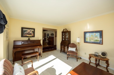 Set on a beautifully landscaped half-acre lot, this spacious on Urbandale Golf and Country Club in Iowa - for sale on GolfHomes.com, golf home, golf lot