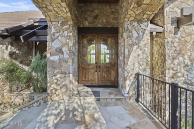 Nestled in the prestigious Rim Golf Club, this stunning custom on The Rim Golf Club in Arizona - for sale on GolfHomes.com, golf home, golf lot