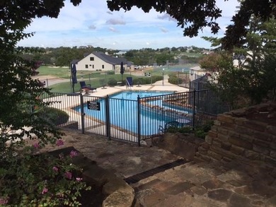 ESCAPE WEST is one of Horseshoe Bays most popular townhome on Apple Rock Golf Course - Horseshoe Bay in Texas - for sale on GolfHomes.com, golf home, golf lot