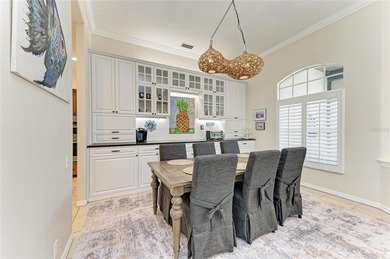 Nestled within a private oasis overlooking a tranquil preserve on River Wilderness Golf and Country Club in Florida - for sale on GolfHomes.com, golf home, golf lot