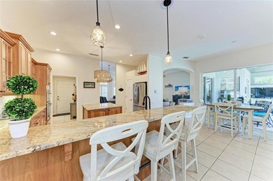 Nestled within a private oasis overlooking a tranquil preserve on River Wilderness Golf and Country Club in Florida - for sale on GolfHomes.com, golf home, golf lot