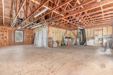Discover your next home in the heart of Clayton, with this on The Neuse Golf Club in North Carolina - for sale on GolfHomes.com, golf home, golf lot