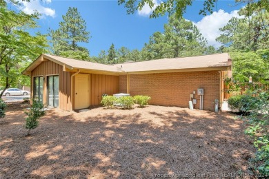 Nestled within the 55+ golf community of Knollwood Village, this on Knollwood Fairways and Driving  in North Carolina - for sale on GolfHomes.com, golf home, golf lot