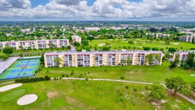 Beautiful1bedroom with 1.5 bath in an Executive Country Club & on Poinciana Golf Club in Florida - for sale on GolfHomes.com, golf home, golf lot