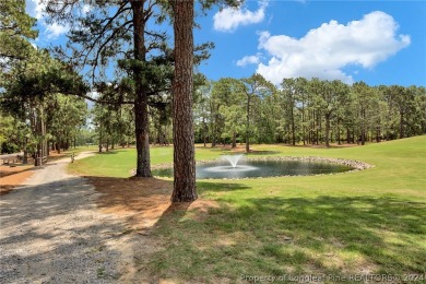 Nestled within the 55+ golf community of Knollwood Village, this on Knollwood Fairways and Driving  in North Carolina - for sale on GolfHomes.com, golf home, golf lot