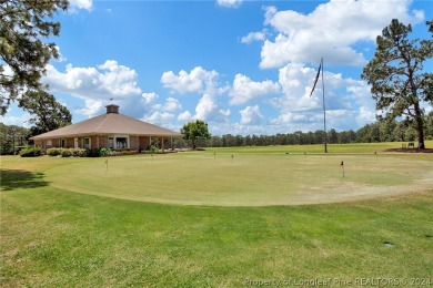 Nestled within the 55+ golf community of Knollwood Village, this on Knollwood Fairways and Driving  in North Carolina - for sale on GolfHomes.com, golf home, golf lot