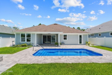 Prime location, premium lot, and high-end finishes define this on Hombre Golf Club in Florida - for sale on GolfHomes.com, golf home, golf lot