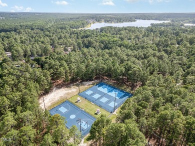 Welcome to this spacious and inviting 2-story home located in on Carolina Lakes Country Club in North Carolina - for sale on GolfHomes.com, golf home, golf lot