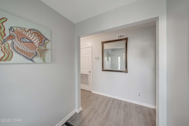 This ground-level, end unit golf villa with no steps in the on Bay Point Resort Golf Club in Florida - for sale on GolfHomes.com, golf home, golf lot