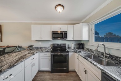 This ground-level, end unit golf villa with no steps in the on Bay Point Resort Golf Club in Florida - for sale on GolfHomes.com, golf home, golf lot