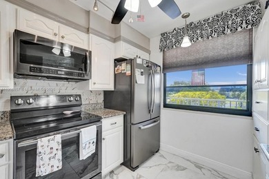 This 2 bedroom 2 bath Whitehall 1 condo features 1,385 sq ft of on Pine Island Ridge Country Club in Florida - for sale on GolfHomes.com, golf home, golf lot