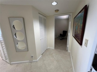 Enjoy your morning coffee on your private balcony, while taking on  in Florida - for sale on GolfHomes.com, golf home, golf lot