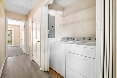 Enjoy low-maintenance living in this charming one-level townhome on Bella Vista - Metfield Golf Complex and Country Club in Arkansas - for sale on GolfHomes.com, golf home, golf lot