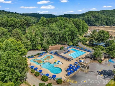 Exceptional location with stunning views of the dramatic on Rumbling Bald Resort on Lake Lure in North Carolina - for sale on GolfHomes.com, golf home, golf lot