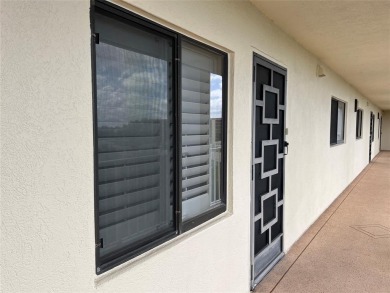 Enjoy your morning coffee on your private balcony, while taking on  in Florida - for sale on GolfHomes.com, golf home, golf lot