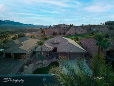 GORGEOUS HOME overlooking the 18th hole of the Falcon Ridge Golf on Falcon Ridge Golf Course in Nevada - for sale on GolfHomes.com, golf home, golf lot