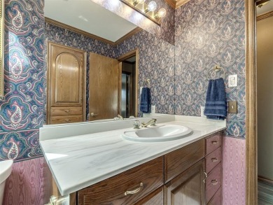 Exceptionally well maintained home with amazing golf course on Cedar Valley Golf Club in Oklahoma - for sale on GolfHomes.com, golf home, golf lot
