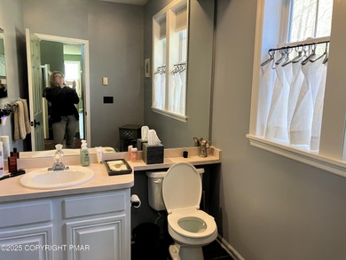 Seller has aggressively priced to sell this stunning on Pinecrest Lake Golf and Country Club in Pennsylvania - for sale on GolfHomes.com, golf home, golf lot