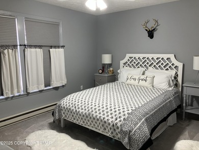 Seller has aggressively priced to sell this stunning on Pinecrest Lake Golf and Country Club in Pennsylvania - for sale on GolfHomes.com, golf home, golf lot