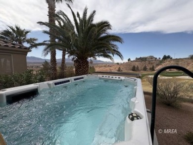 GORGEOUS HOME overlooking the 18th hole of the Falcon Ridge Golf on Falcon Ridge Golf Course in Nevada - for sale on GolfHomes.com, golf home, golf lot