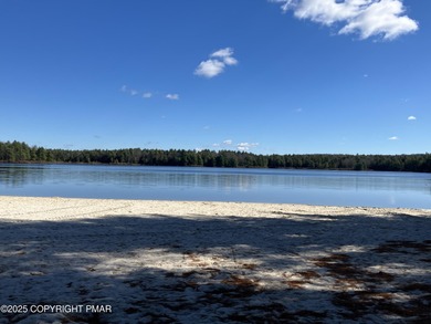 Seller has aggressively priced to sell this stunning on Pinecrest Lake Golf and Country Club in Pennsylvania - for sale on GolfHomes.com, golf home, golf lot