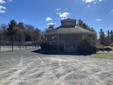 Seller has aggressively priced to sell this stunning on Pinecrest Lake Golf and Country Club in Pennsylvania - for sale on GolfHomes.com, golf home, golf lot