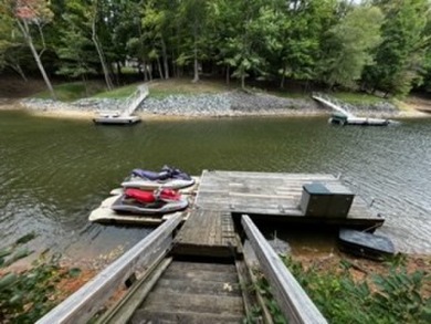 Waterfront home with a dock and 2 jet ski ports in Merifield on Kinderton Country Club in Virginia - for sale on GolfHomes.com, golf home, golf lot