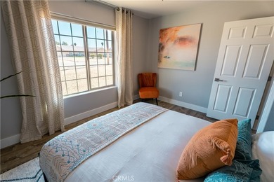 Located directly across from Joshua Tree National Park, this on Roadrunner Dunes Golf Course in California - for sale on GolfHomes.com, golf home, golf lot