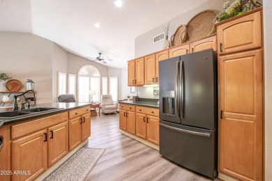 Discover your dream home in this beautifully remodeled residence on Tuscany Falls At Pebble Creek in Arizona - for sale on GolfHomes.com, golf home, golf lot
