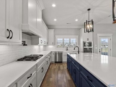 Overlooking Hole #5 of Canebrake Golf Course, this thoughtfully on Canebrake Golf Club in Alabama - for sale on GolfHomes.com, golf home, golf lot