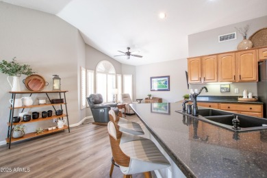 Discover your dream home in this beautifully remodeled residence on Tuscany Falls At Pebble Creek in Arizona - for sale on GolfHomes.com, golf home, golf lot