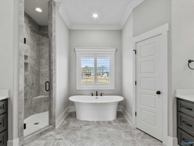 Overlooking Hole #5 of Canebrake Golf Course, this thoughtfully on Canebrake Golf Club in Alabama - for sale on GolfHomes.com, golf home, golf lot