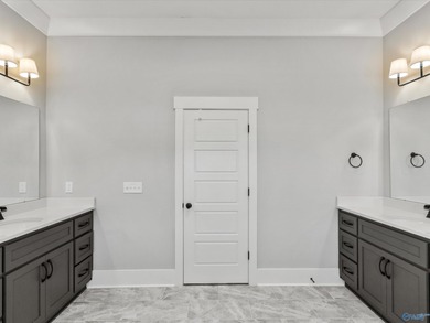 Overlooking Hole #5 of Canebrake Golf Course, this thoughtfully on Canebrake Golf Club in AL - for sale on GolfHomes.com, golf home, golf lot