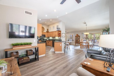 Discover your dream home in this beautifully remodeled residence on Tuscany Falls At Pebble Creek in Arizona - for sale on GolfHomes.com, golf home, golf lot