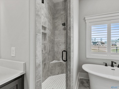 Overlooking Hole #5 of Canebrake Golf Course, this thoughtfully on Canebrake Golf Club in AL - for sale on GolfHomes.com, golf home, golf lot