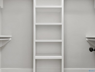 Overlooking Hole #5 of Canebrake Golf Course, this thoughtfully on Canebrake Golf Club in AL - for sale on GolfHomes.com, golf home, golf lot