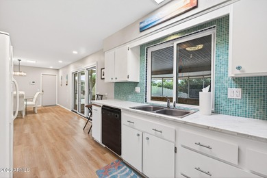 Located in the desirable 55+ community of Sun City, this on PalmBrook Country Club in Arizona - for sale on GolfHomes.com, golf home, golf lot