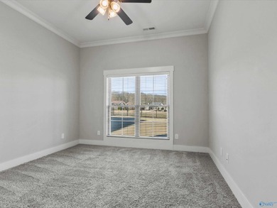 Overlooking Hole #5 of Canebrake Golf Course, this thoughtfully on Canebrake Golf Club in AL - for sale on GolfHomes.com, golf home, golf lot