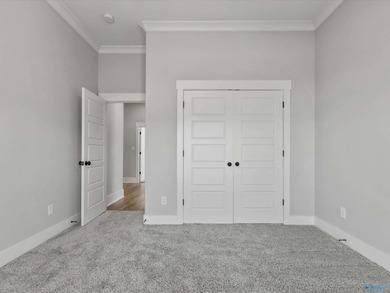 Overlooking Hole #5 of Canebrake Golf Course, this thoughtfully on Canebrake Golf Club in AL - for sale on GolfHomes.com, golf home, golf lot