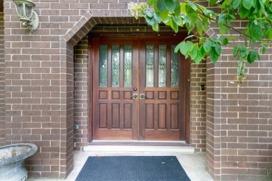 Welcome to this exceptional 5-bedroom, 4.1-bathroom residence on Hillcrest Country Club in Illinois - for sale on GolfHomes.com, golf home, golf lot