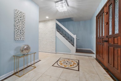 Welcome to this exceptional 5-bedroom, 4.1-bathroom residence on Hillcrest Country Club in Illinois - for sale on GolfHomes.com, golf home, golf lot