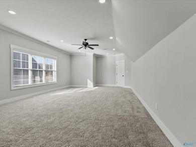 Overlooking Hole #5 of Canebrake Golf Course, this thoughtfully on Canebrake Golf Club in AL - for sale on GolfHomes.com, golf home, golf lot