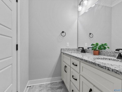 Overlooking Hole #5 of Canebrake Golf Course, this thoughtfully on Canebrake Golf Club in AL - for sale on GolfHomes.com, golf home, golf lot