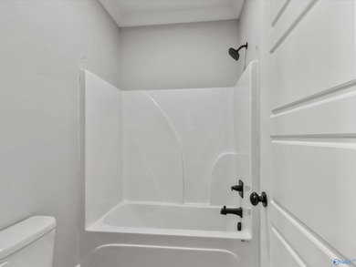 Overlooking Hole #5 of Canebrake Golf Course, this thoughtfully on Canebrake Golf Club in AL - for sale on GolfHomes.com, golf home, golf lot