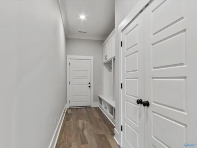 Overlooking Hole #5 of Canebrake Golf Course, this thoughtfully on Canebrake Golf Club in AL - for sale on GolfHomes.com, golf home, golf lot